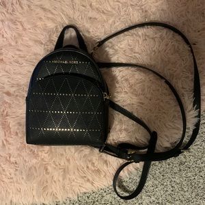 Gently used Michael Kors backpack/purse! Adorable with lots of storage